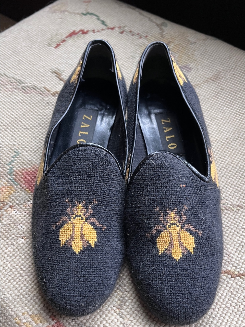Zalo Black Knit Slip-Ons with Gold Bee Motif
